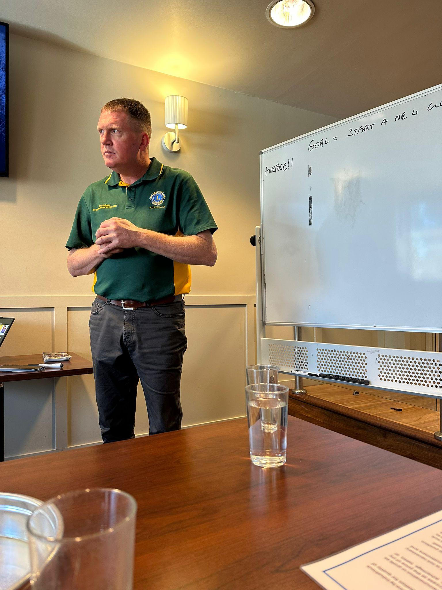 Lions Australia mentor leading a SMULC planning session in front of a whiteboard